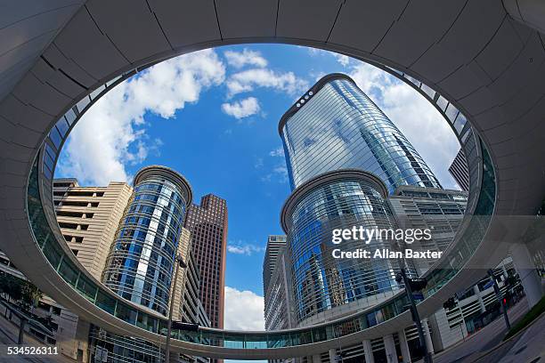 postmodern skyscrapers in downtown houston - circular business district stock pictures, royalty-free photos & images