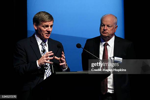 Finance Minister Bill English speaks while ANZ CEO David Hisco looks on during a post-budget breakfast at Te Papa on May 27, 2016 in Wellington, New...