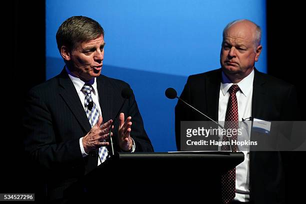 Finance Minister Bill English speaks while ANZ CEO David Hisco looks on during a post-budget breakfast at Te Papa on May 27, 2016 in Wellington, New...