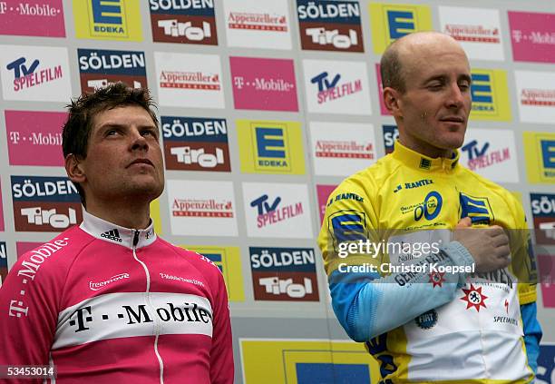 Jan Ullrich of Germany and T-Mobile and Levi Leipheimer of Gerolsteiner and U.S. Stand on the podium after coming 2nd and 1st respectively in the...