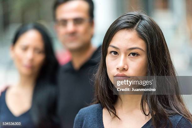 asian teenage girl - family portrait serious stock pictures, royalty-free photos & images