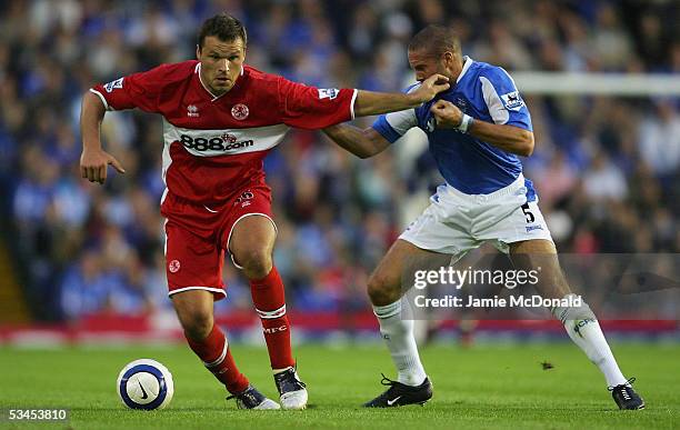 Mark Viduka of Middlesbrough holds off Matthew Upson of Birmingham during the Barclays Premiership match between Birmingham City and Middlesbrough at...