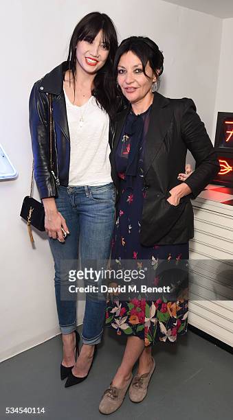 Daisy Lowe and Pearl Lowe attend a private view of 'Art Electric', a collaboration between artists Zoe Grace and John Morrissey, at Lawrence Alkin...