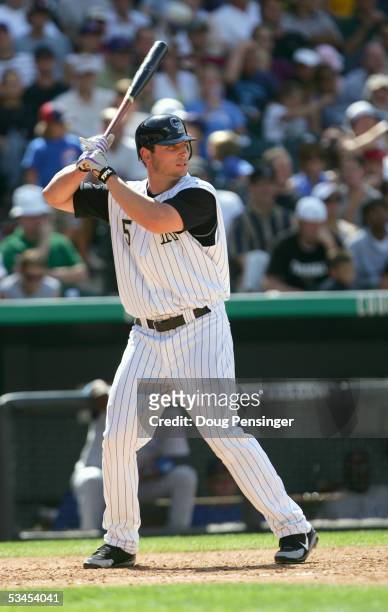 Matt Holliday of the Colorado Rockies stands ready at bat during the game against the Chicago Cubs on August 21, 2005 at Coors Field in Denver,...