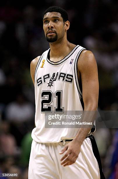 Tim Duncan of the San Antonio Spurs walks upcourt during the game against the Detroit Pistons in Game seven of the 2005 NBA Finals at SBC Center on...