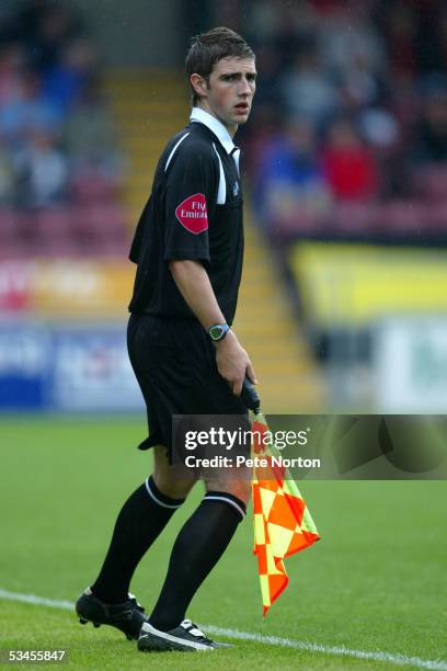 The youngest assistant referee in the league Steve Cook makes his first appearance during the Coca Cola League two match between Northampton Town and...