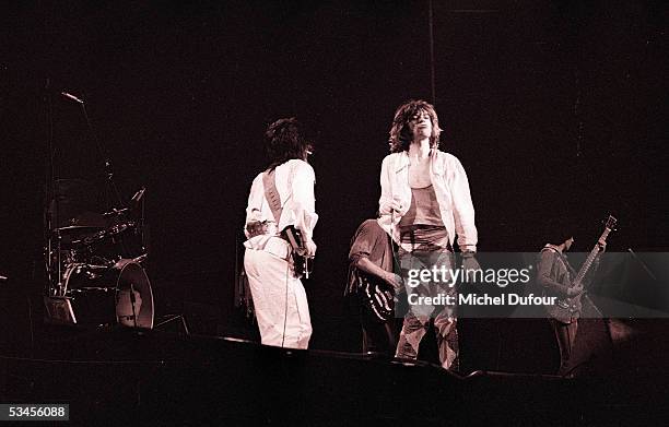 Musicians Ron Wood, Keith Richards, Mick Jagger and Bill Wyman of The Rolling Stones perform on stage in 1976 in Paris, France.