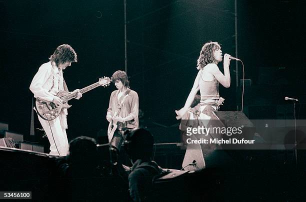 Ron Wood, Keith Richards, Bill Wyman and Mick Jagger of The Rolling Stones perform on stage in 1976 in Paris, France.