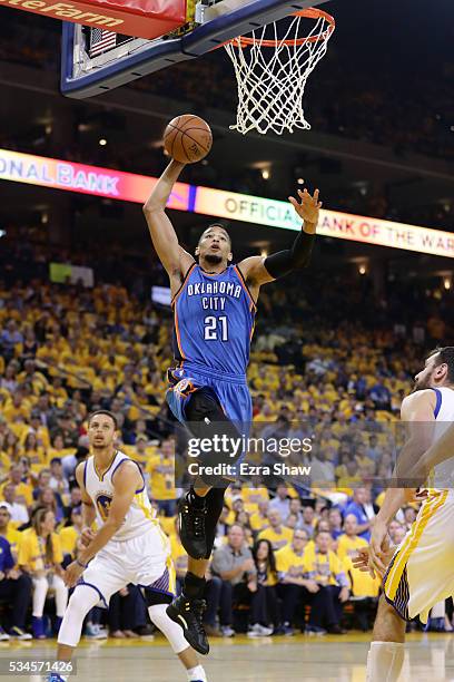 Andre Roberson of the Oklahoma City Thunder dunks the ball against the Golden State Warriors during Game Five of the Western Conference Finals during...