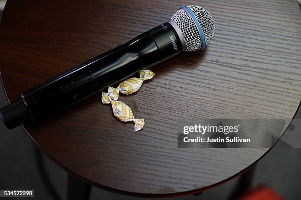 Cough drops and a microphone sit on a stool for democratic presidential candidate former Secretary of State Hillary Clinton during a campaign event...