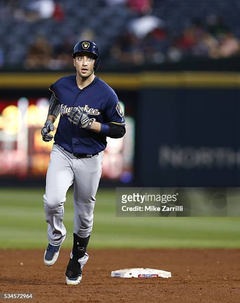 Left fielder Ryan Braun of the Milwaukee Brewers runs the bases after hitting a solo home run in the fifth inning during the game against the Atlanta...