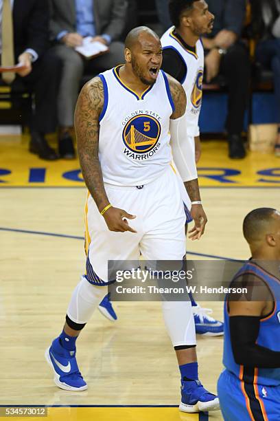 Marreese Speights of the Golden State Warriors reacts after a bucket against the Oklahoma City Thunder during Game Five of the Western Conference...