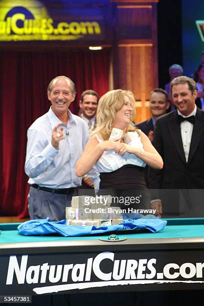 Mike Sigel's wife takes the cash at the International Pool Tour World 8-Ball Championship at the Mandalay Bay Resort & Casino August 20, 2005 in Las...