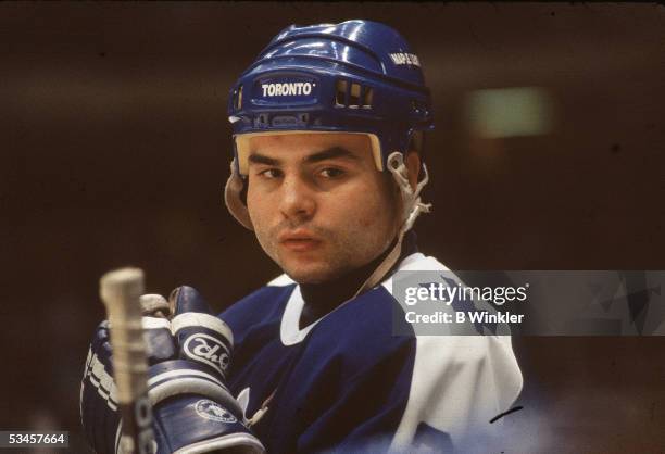 Canadian professional hockey player John Kordic of the Toronto Maple Leafs skates on the ice during an away game, 1989.