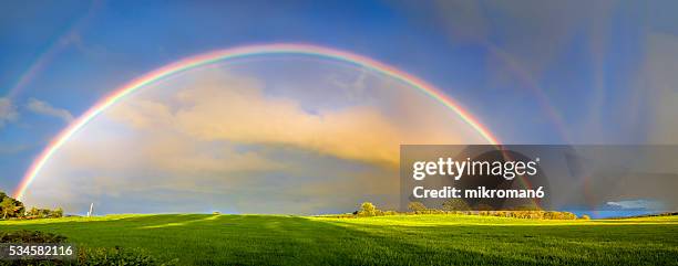 double rainbow landscape in beautiful irish landscape scenery. - rainbow foto e immagini stock