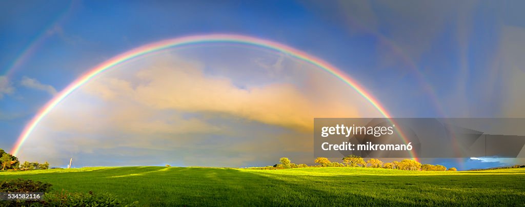 Double rainbow landscape in beautiful Irish landscape scenery.