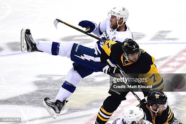 Steven Stamkos of the Tampa Bay Lightning falls to the ice after colliding with Matt Cullen of the Pittsburgh Penguins during the third period in...