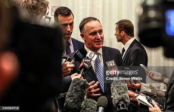 Prime Minister of New Zealand the Right Honourable John Key talks to media on May 27, 2016 in Auckland, New Zealand. Finance Minister Bill English...