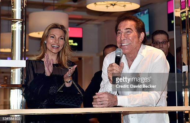 Wynn Resorts Chairman and CEO Steve Wynn speaks as his wife Andrea Wynn applauds during the grand opening of the Wynn Las Vegas Poker Room at Wynn...