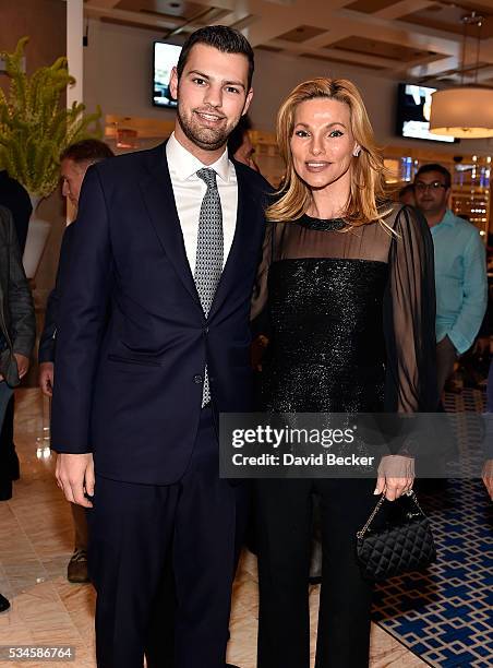 Alex Hissom and his mother Andrea Wynn attend the grand opening of the Wynn Las Vegas Poker Room at Wynn Las Vegas on May 26, 2016 in Las Vegas,...