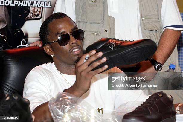 Sean "Diddy" Combs attends the launch of his footwear collection, Sean John Elite Footwear at the Dolphin Mall on August 24, 2005 in Miami, Florida.