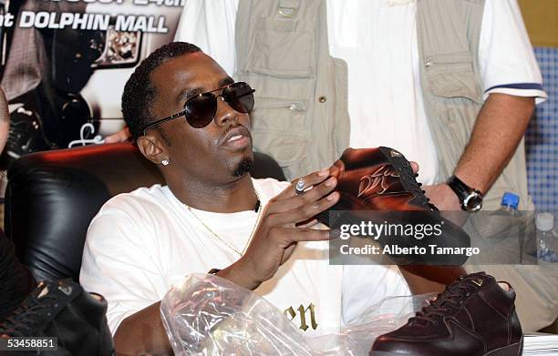 Sean "Diddy" Combs attends the launch of his footwear collection, Sean John Elite Footwear at the Dolphin Mall on August 24, 2005 in Miami, Florida.