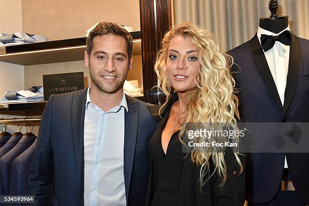 Presenter Julien Benedetto from France2 and interior designer Julia Battaia attend Corneliani Paris Shop Opening Party on May 26, 2016 in Paris,...