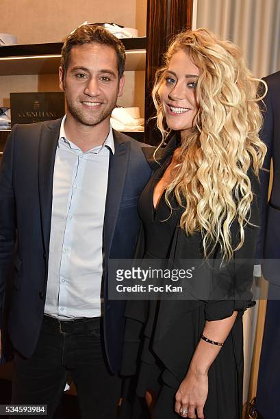 Presenter Julien Benedetto from France2 and interior designer Julia Battaia attend Corneliani Paris Shop Opening Party on May 26, 2016 in Paris,...
