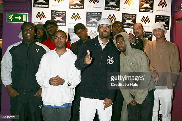Mcs, Bubbles; Wiley; Jet; Ree; Scratch; Pittbull; Breeze; Jamaka-B; Flow Dan of Roll Deep pose in front of arrivals board at the Nominations and...