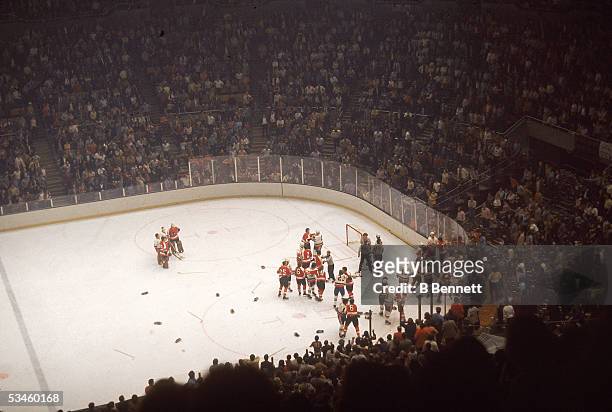 Professional hockey teams the Philadelphia Flyers and the New York Islanders brawl on the ice during a game at Nassau Coliseum, Uniondale, New York,...