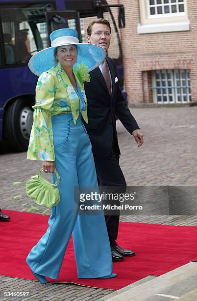 Dutch Prince Constantijn and Princess Laurentien arrive for the civil wedding ceremony at The Loo Palace on August 25, 2005 in Apeldoorn, The...