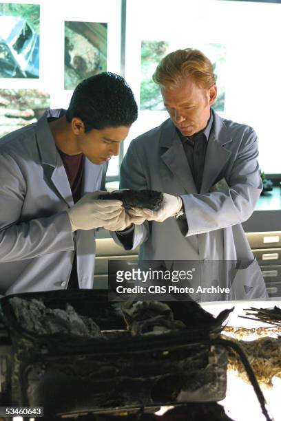 Ashes to Ashes" -- Delko and Horatio investigate the charred remains of a pregnant female victim and recover a diamond ring from her stomach, on CSI:...