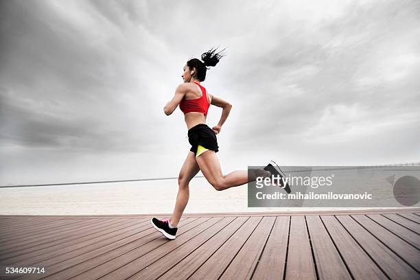 morning exercise - female muscle calves stock pictures, royalty-free photos & images