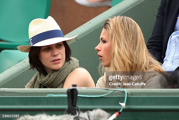 Figure skater Nathalie Pechalat and cyclist Marion Rousse attend day 5 of the 2016 French Open held at Roland-Garros stadium on May 26, 2016 in...