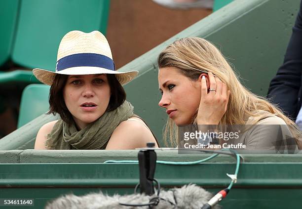 Figure skater Nathalie Pechalat and cyclist Marion Rousse attend day 5 of the 2016 French Open held at Roland-Garros stadium on May 26, 2016 in...