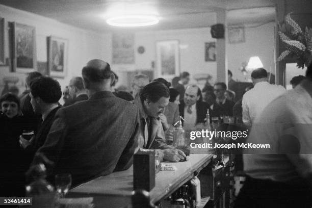 Crowded bar in Soho, London, 16th July 1955. Original publication: Picture Post - 7855 - London's Little Europe - pub. 1955