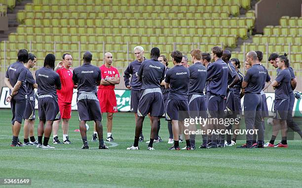 Liverpool FC football manager Rafael Benitez gives instructions to his players during a training session on the eve of the Super Cup final UEFA...