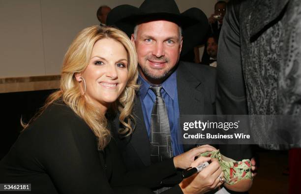 Newly engaged country music stars Trisha Yearwood and Garth Brooks attended the Starkey Hearing Foundation's So the World May Hear Awards Gala in St....