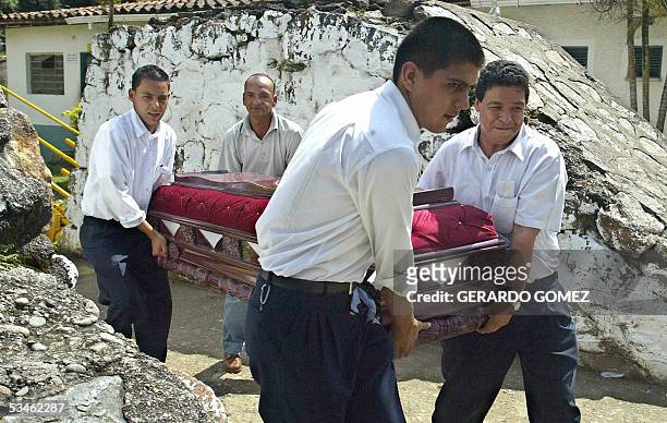 Un familiar de uno de los 14 recolectores de hoja de coca, que segun fuentes militares fueron asesinados por supuestos miembros de las Fuerzas...