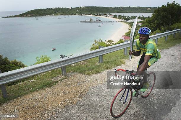 Member of Anguilla?s Link Cycling Association participates in the Melbourne 2006 Queen?s Baton Relay by transporting the baton past world-class...