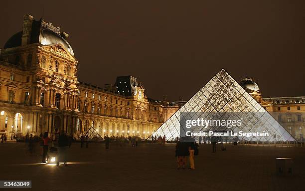 The Pyramide of the Louvre museum designed by I.M. Pei is seen on August 24, 2005 in Paris, France. Dan Brown is the author of numerous bestsellers,...