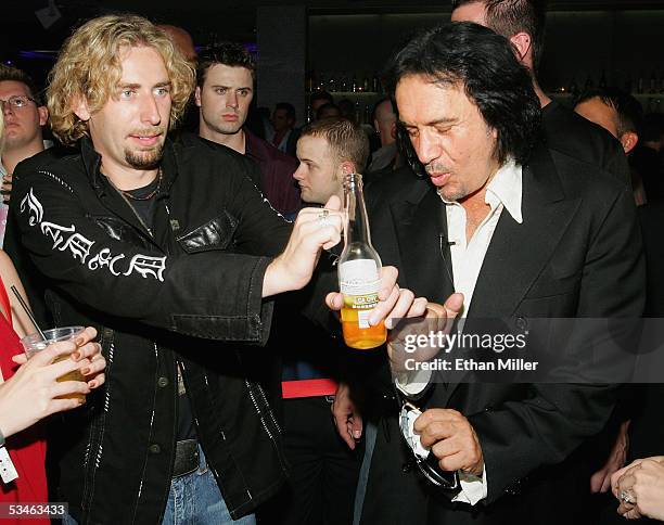 Nickelback frontman Chad Kroeger and Kiss singer/bassist Gene Simmons joke around during Simmons' birthday party at the Ghostbar at the Palms Casino...