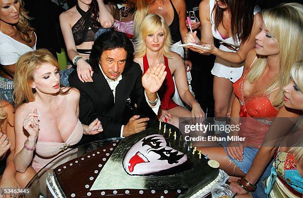 Kiss singer/bassist Gene Simmons waves during his birthday party at the Palms Casino Resort August 25, 2005 in Las Vegas, Nevada. Adult film actress...