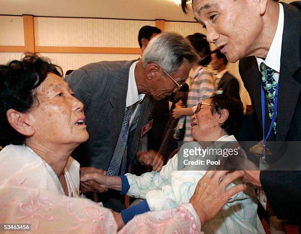 South Korean Lee Jung-Ja 83 years old cries as she meets her North Korean family at the Kumgangsan hotel on August 26, 2005 in Mt. Kumgang, North...