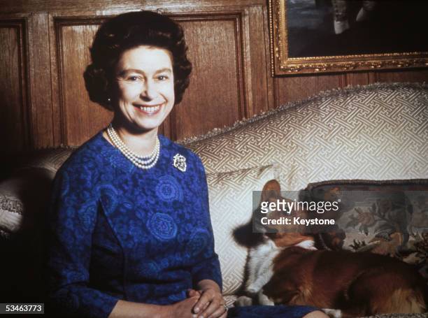 Queen Elizabeth II with a corgi, 1970.