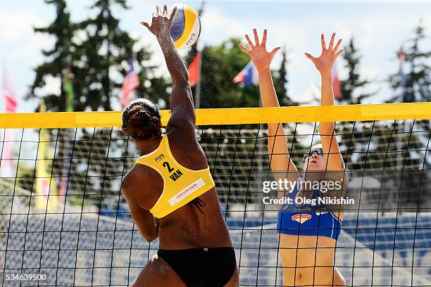 Linline Matauatu of Vanuatu and Summer Ross of USA duel at the net on 3d day of the FIVB Moscow Grand Slam on May 26, 2016 in Moscow, Russia.