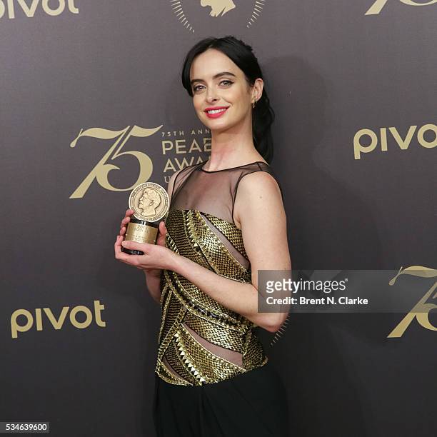 Official recipient for "Marvel's Jessica Jones", Actress Krysten Ritter poses for photographs in the press room during the 75th Annual Peabody Awards...