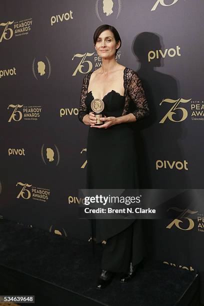 Official recipient for "Marvel's Jessica Jones", Actress Carrie-Anne Moss poses for photographs in the press room during the 75th Annual Peabody...