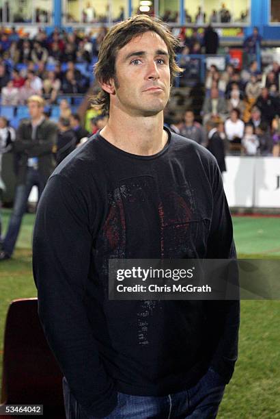 Newcastle rugby league player Andrew Johns watches on during the Hyundai A-League round one match between the Newcastle Jets and Adelaide United held...