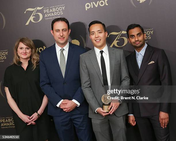Official recipients for "Master of None", Amy Williams, Igor Srubschic, co-crerators/executive producers Alan Yang and Aziz Ansari pose for...
